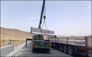 عملیات ایمن ‌سازی مسیرهای دسترسی تونل وحدت همزمان با اجرای لایه دوم آسفالت